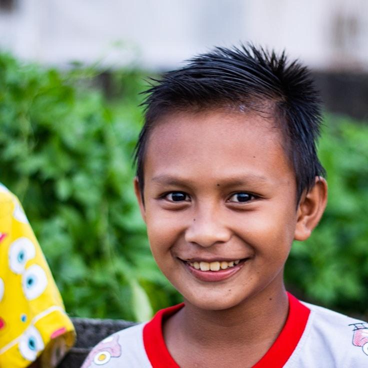 Kaveri Mehta, Lead Design Curator at Paper Frame Haven, reviewing corporate floral arrangements